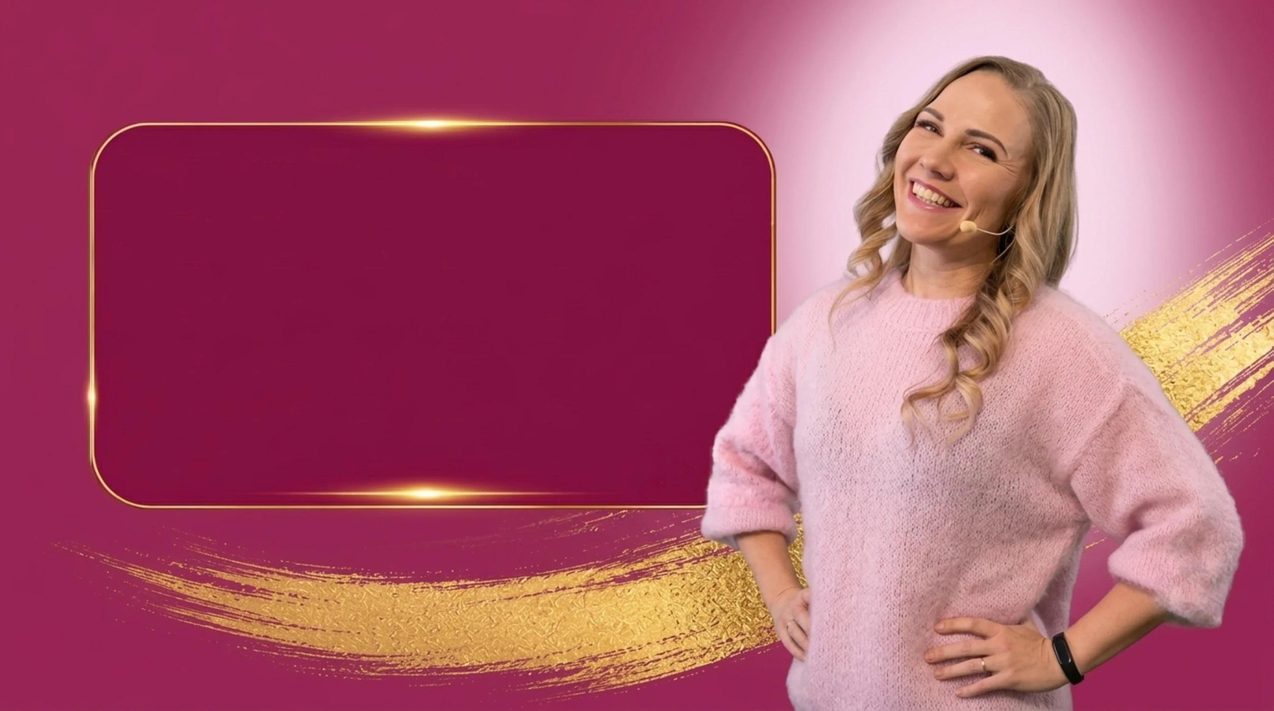 Elina hymyillen vaaleanpunaisessa neulepaidassa
